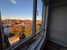 Detailed view of baseboards and a view of city