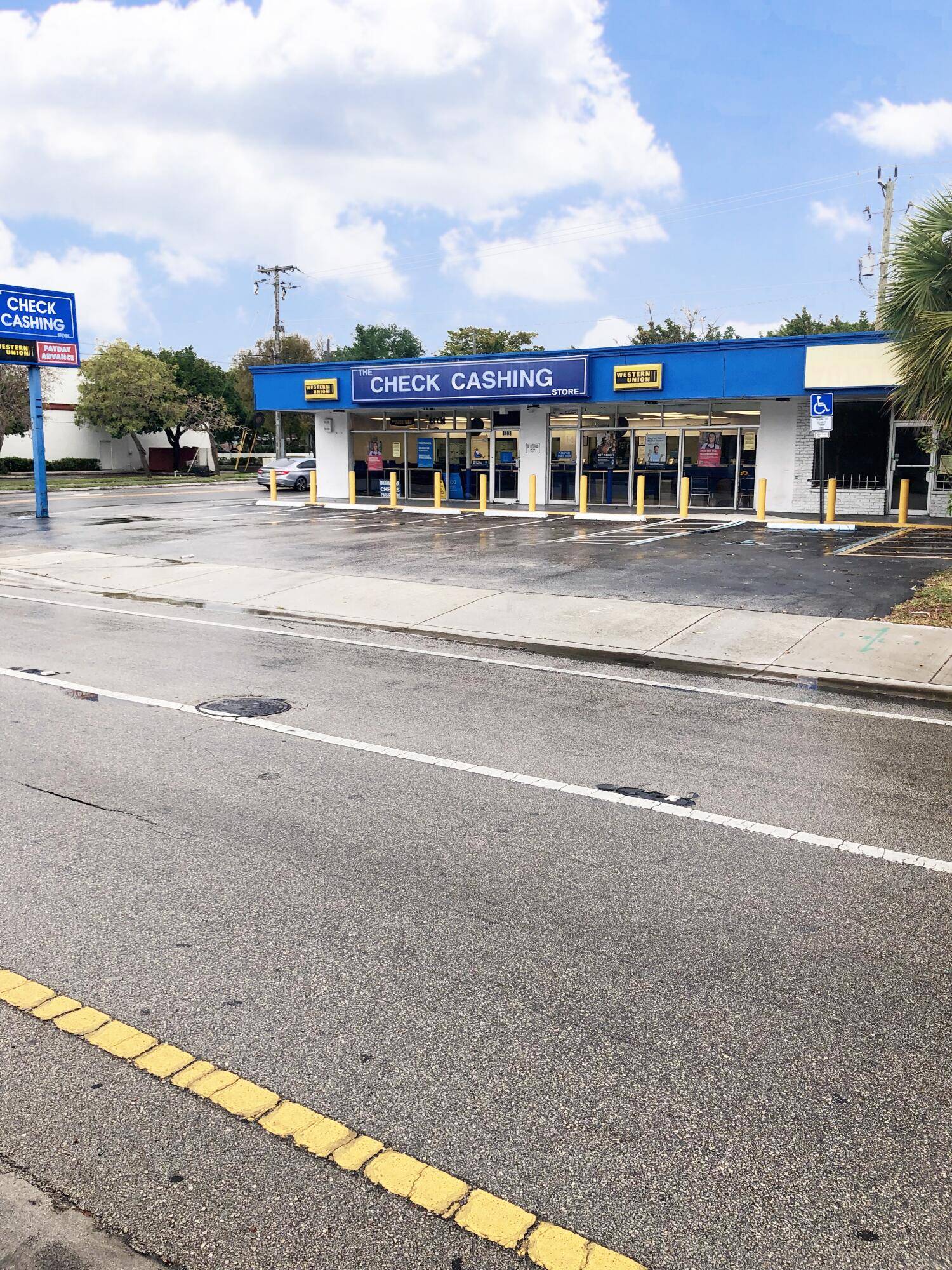 Commercial Building containing two units on with excellent visibility on busy Davie Blvd.