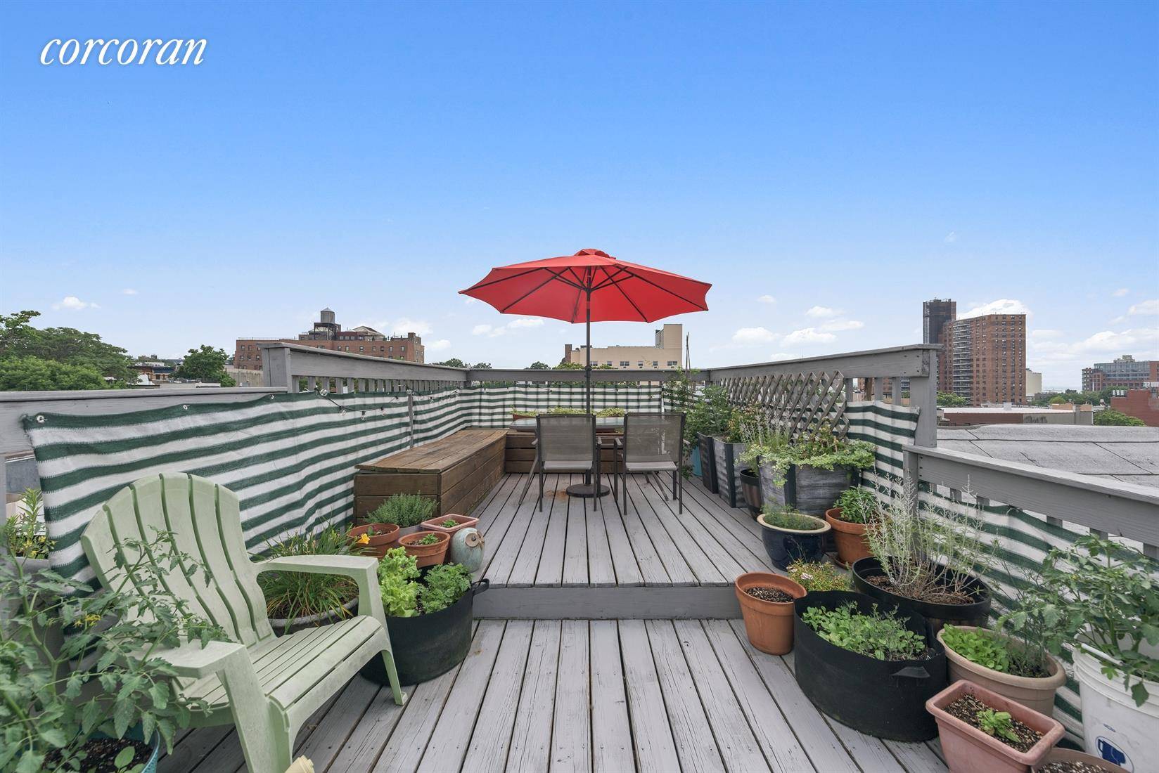 Enjoy dining and gardening with unobstructed views of Manhattan and New York Harbor from your two tiered, recently waterproofed PRIVATE roofdeck.