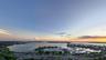 Sweeping panoramic views from the Sky Speakeasy showcase Sarasota Bay, The Gulf of Mexico, and the iconic Ringling Bridge, creating a breathtaking bac