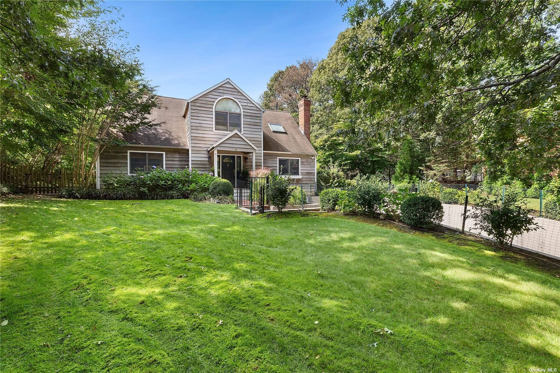 Exceptional residence located in Northwest Woods, just three miles from East Hampton Village, this chic, renovated four bedroom, three bathroom home is a true gem.