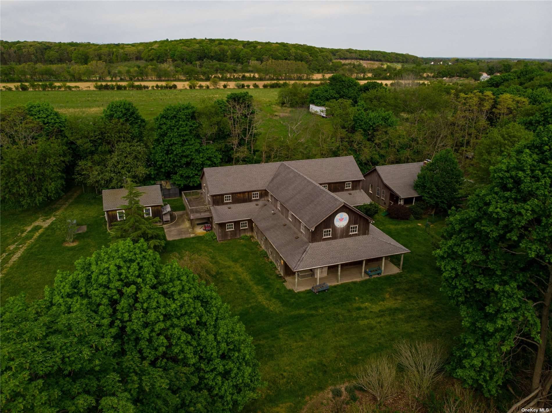 Nestled at the Gateway to the North Fork with over 105 acres of property on Sound Ave.