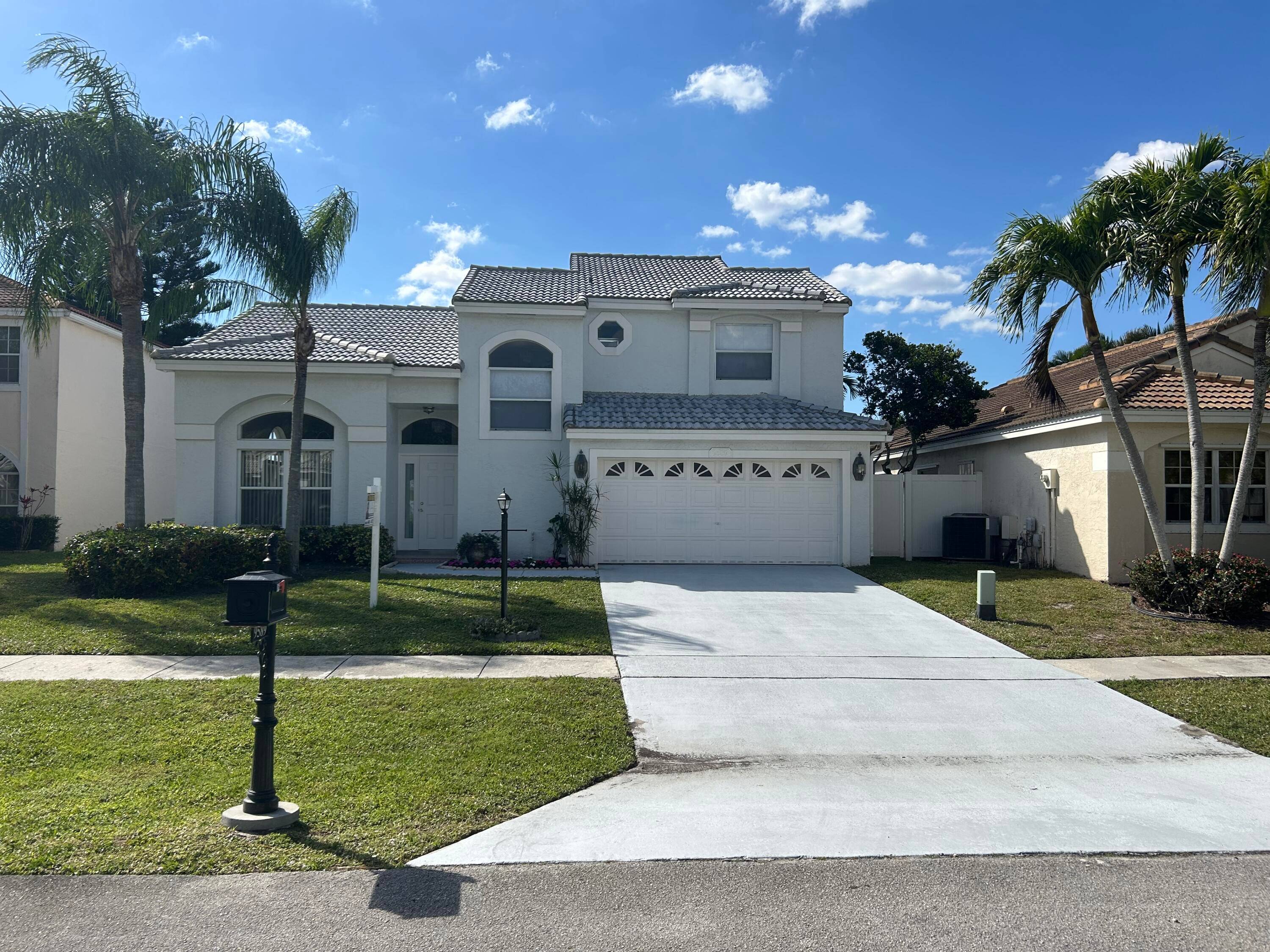 Quick Move In Beautiful Lake View from this Light and Bright, spacious and open 4 bedroom 2 1 2 bath home Master Bedroom downstairs and 3 bedrooms upstairs.