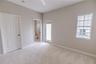 Third floor guest suite with spacious closets and a serene ensuite bath.