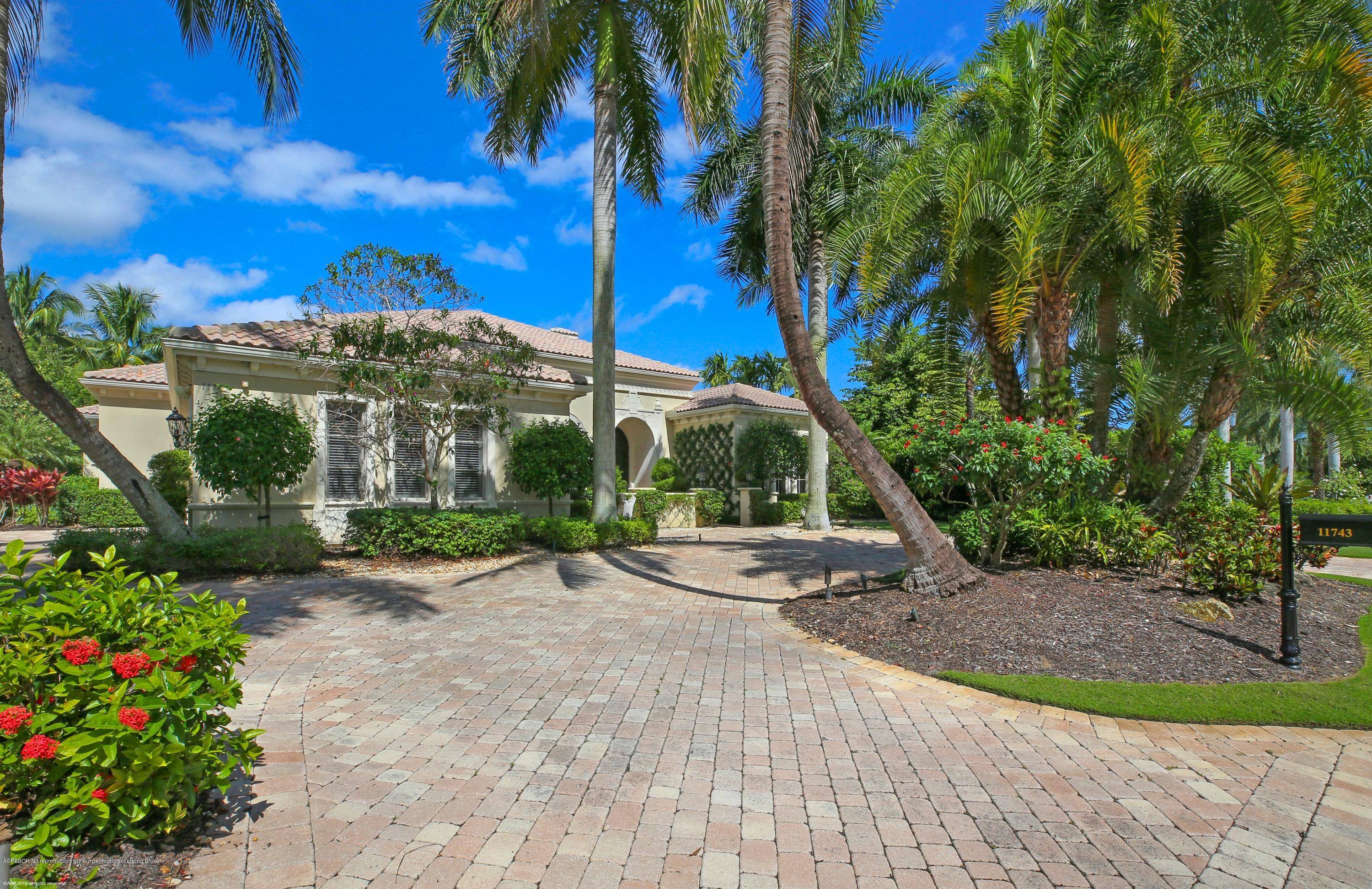 Take advantage of an opportunity to own this stunning home located in the Grand Estates of Old Palm Golf Club.