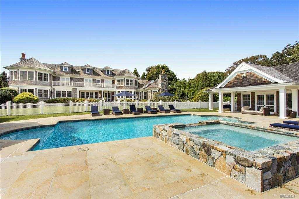 EXTRAVAGANT ESTATE IN THE HEART OF QUOGUE SOUTH.