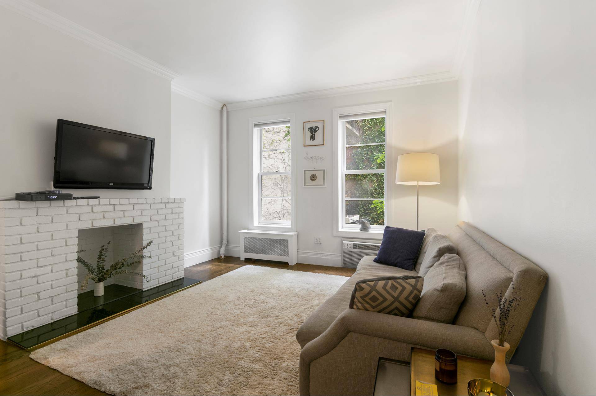 Located on a tranquil tree lined street in the heart of the West Village, this spacious one bedroom, one bathroom is in excellent condition with walnut oak plank floors, high ...