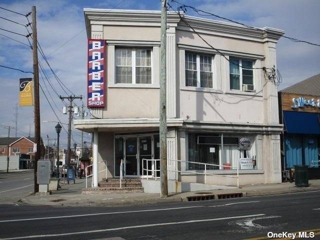 Excellent 4 Unit Investment Property With 2 Stores amp ; 2 Apartments.