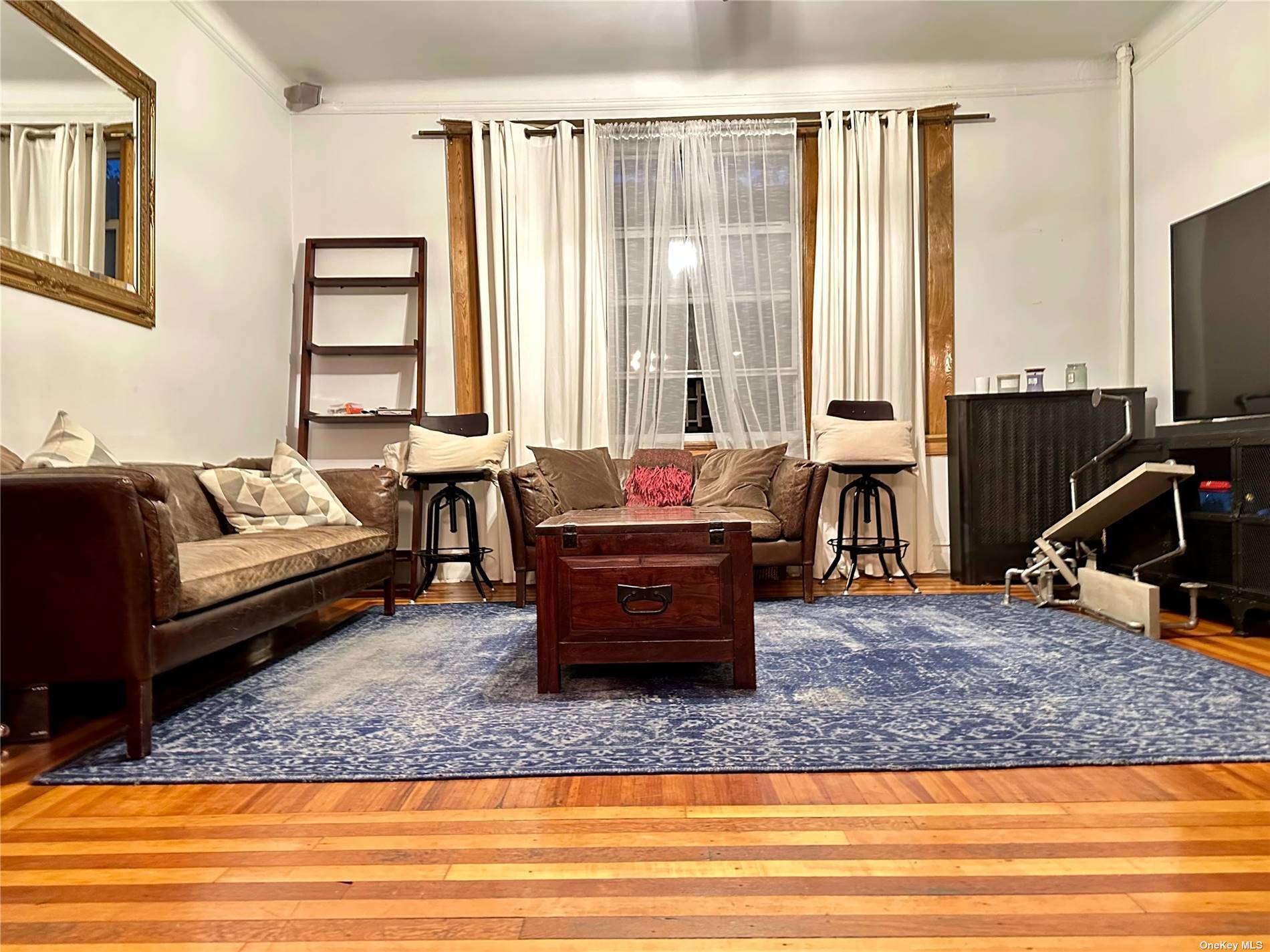 This prewar two bedroom co op in Jackson Heights is a charming living space with some great features.