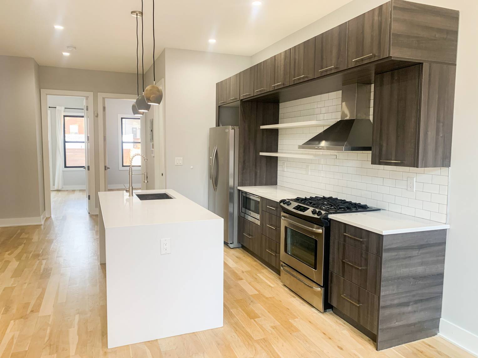 No Fee ! Beautifully renovated apartment that features brand new kitchen, central AC and backyard.