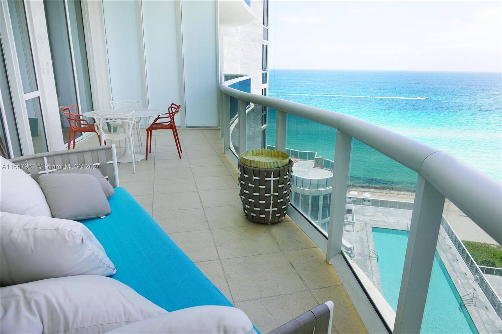 OCEANFRONT FULLY FURNISHED 2 BED DEN 3 BATH CONDO IN A LUXURY TRUMP TOWER WITH 5 STAR AMENITIES.