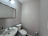 Bathroom with toilet and a sink