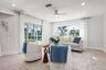 Living area with sliding doors to the pool deck
