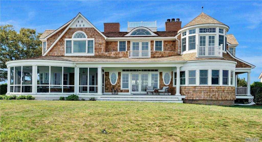 RARE WATERFRONT RENTAL IN QUOGUE AVAILABLE for March and April 2021 Experience waterfront living in this classic traditional with 222 ft.