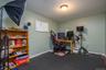 Additional finished room currently used for social media and had been a weight room.