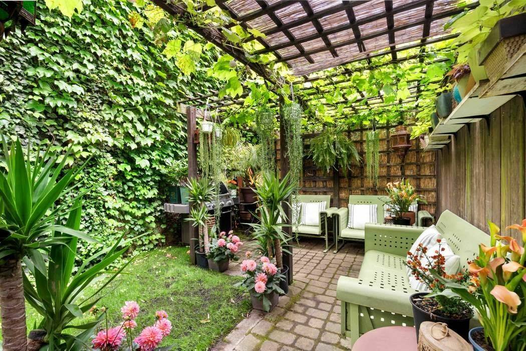 THREE OUTDOOR SPACES ! Be prepared to fall in love with this stunning and bright Garden level duplex home, which has been transformed into an artfully executed modern home in ...