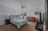 Primary bedroom with half bath