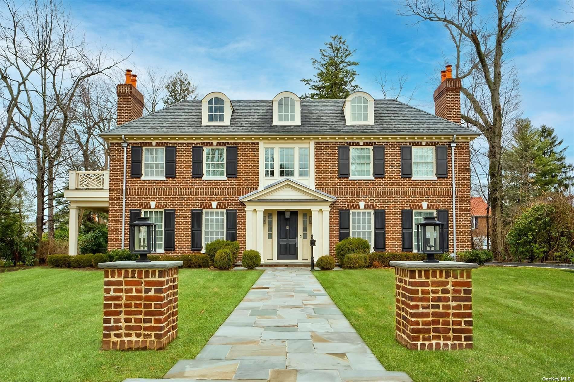 Welcome to Stunning 7 Bedrooms Brick Center Hall Colonial Set On One Of The Prettiest Tree Lined Streets In Manhasset.