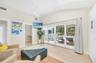 The Casita boasts a wall of sliding doors with tropical and pool views