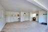 Enclosed carport/garage area. The doors in the back are to storage areas.