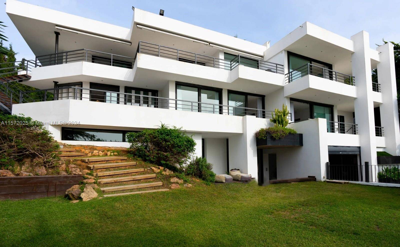 This luxury contemporary villa is a grand and stunning showpiece property spread across 3 storeis.