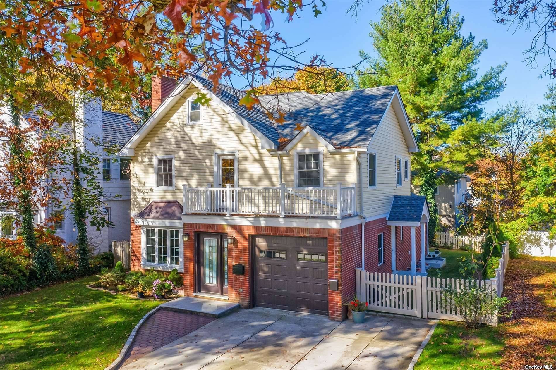 Welcome to the luxurious living provided by this stunning southern exposure colonial on Park Avenue in Manhasset.