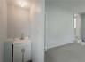 Flex space (400 sqft) with high ceilings, private exterior entrance/exit, and sink/plumbing.