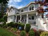 Beautifully landscaped front yard with stunning curb appeal.