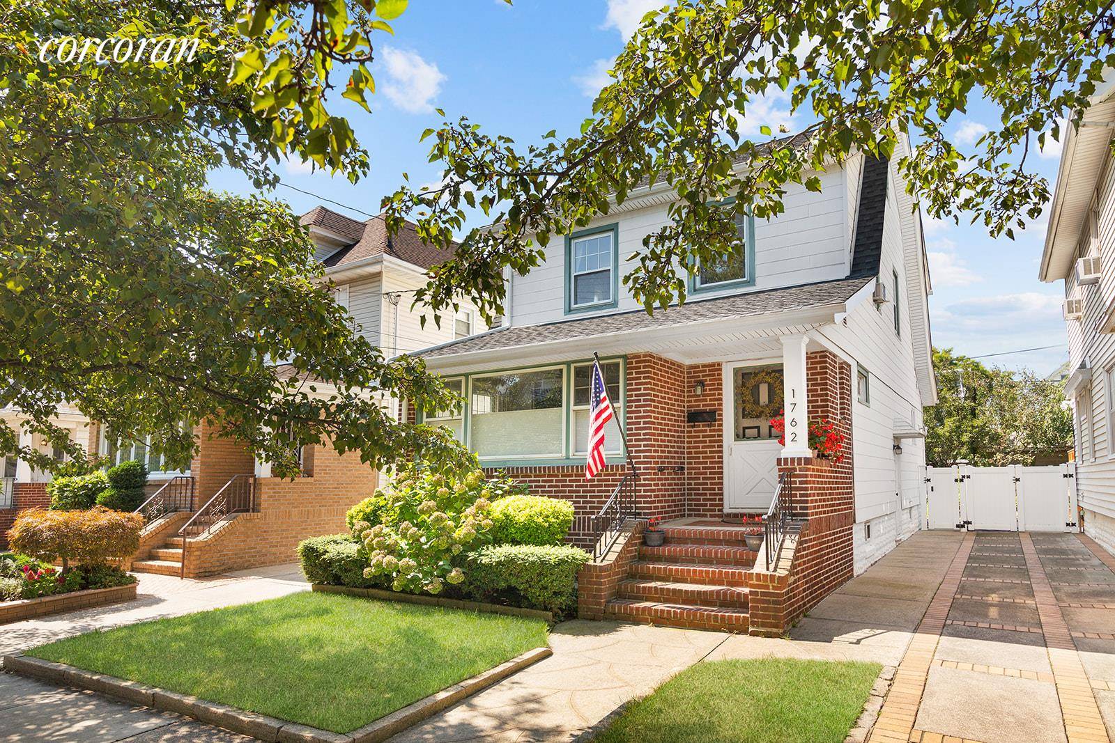 Beautifully renovated, four bedroom, two and a half bath home with finished basement, long private driveway and extra large private garage on beautiful tree lined Madison Place.