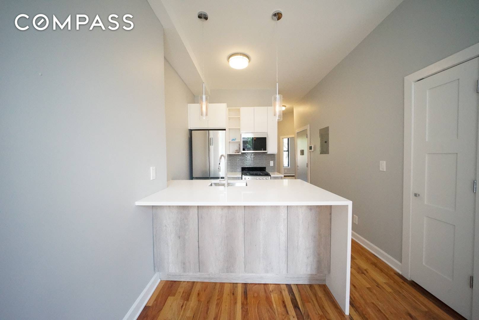 572 Myrtle Avenue is a brand new renovation featuring custom kitchen with huge quartz island and breakfast bar, stainless steel appliance package including dishwasher, and custom details throughout.