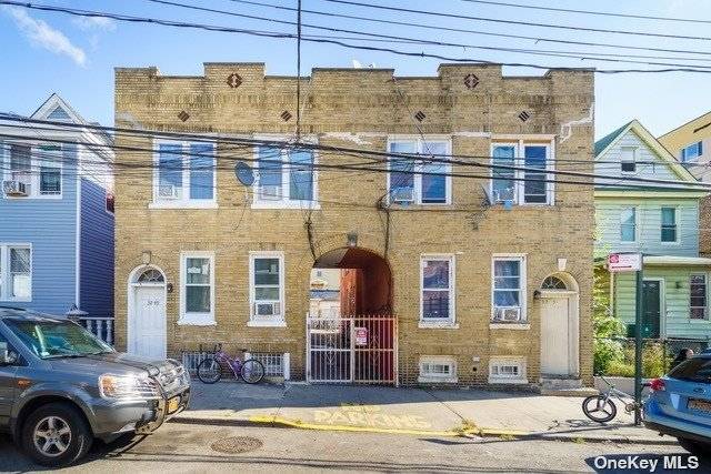 In The Heart Of East Elmhurst Surrounded By Diverse Cultures Is This Spacious 3 Dwelling Home.