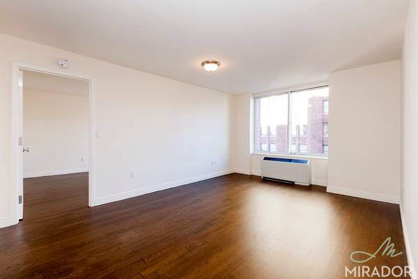 Bright and sunny two bedroom apartment with new strip hardwood floors, solar shades, a large open living space with dining area, abundant closets including a walk in, oversized windows, two ...