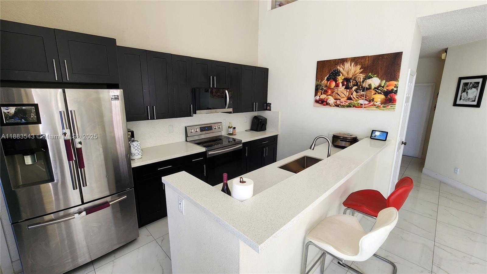 Beautiful WATER VIEW 3 bedroom 3 bathroom with one car garage, recently installed 24in tile and new flooring.