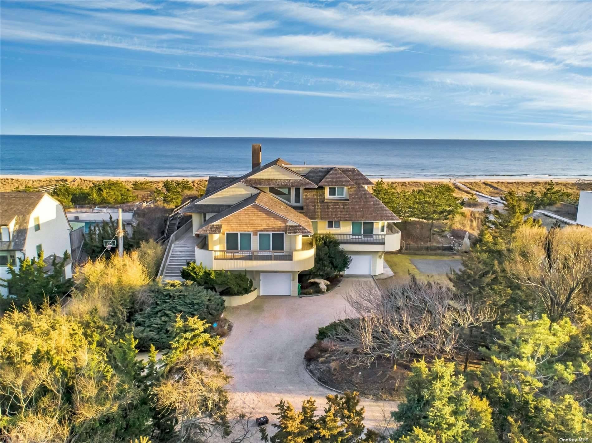 Spectacular Panoramic Ocean Views with over 140ft of Beach Frontage, and over an acre.