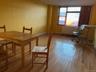 Dining space with light hardwood / wood-style flooring