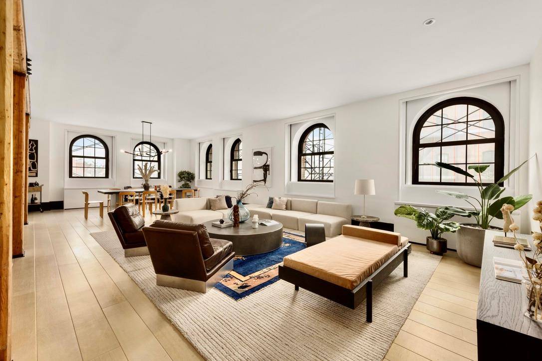 At almost 4000 ft., this vast and expansive loft like home is situated on a highly coveted corner of Tribeca's premier luxury landmarked condominium.