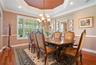 Formal Dining Room: Tray Ceiling, Chair Railing, Brazilian Cherry Wood, Recessed Lighting
