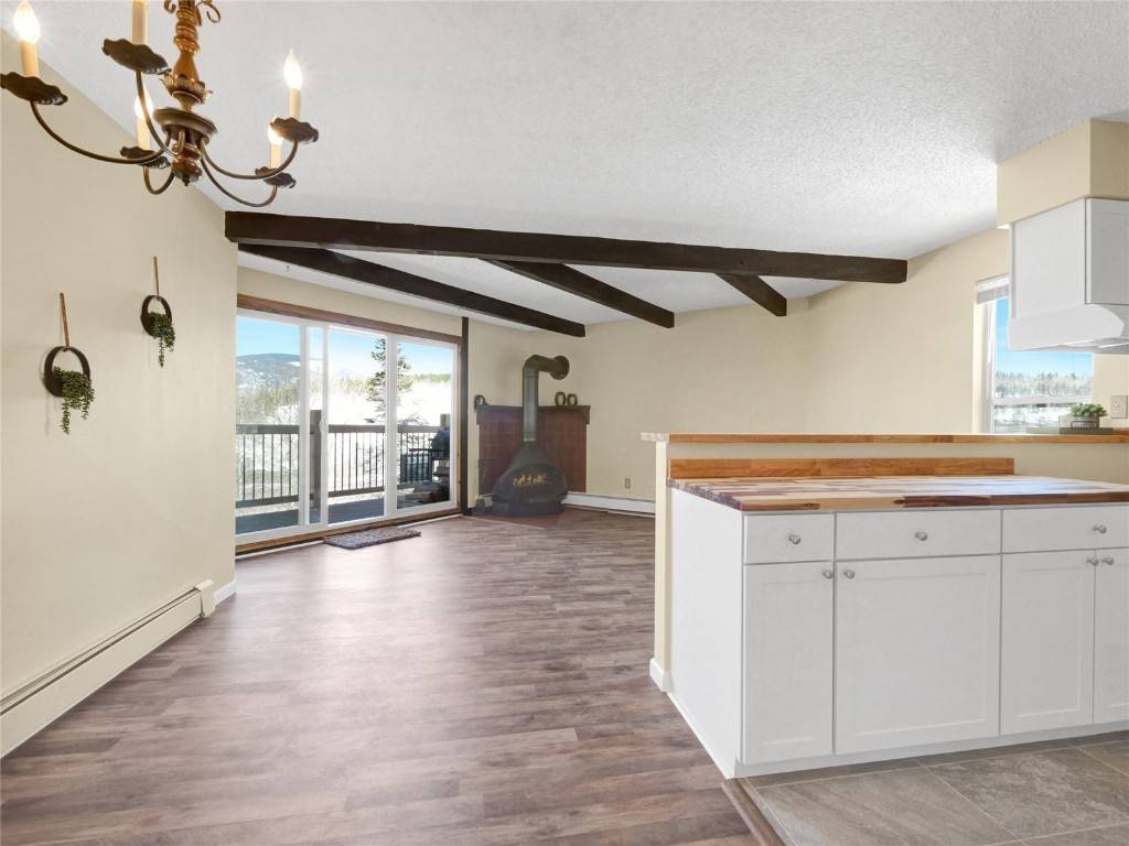 Remodeled condo with brand new kitchen, bath, and floors throughout.