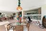 Reverse view of sun room looking back to entry to family room area.
