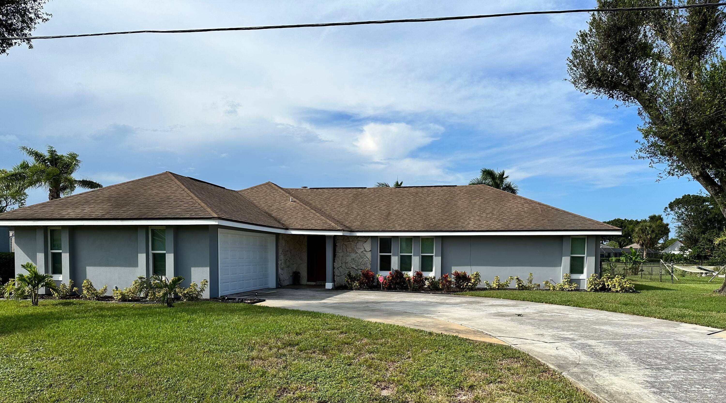 You will love this charming 3 bedroom 2 bathroom pool home in the desirable area of Holiday Pines !
