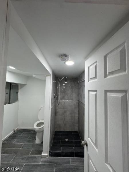 This property offers two legal units plus a fully finished basement, providing excellent rental potential or flexible living options.