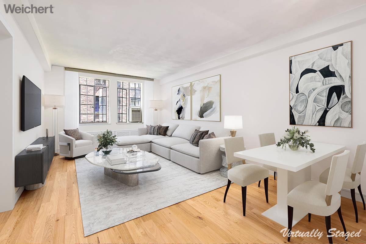 Welcome home to this lovely 2 Bedroom 2 Bathroom corner unit at the Essex House in Tudor City.
