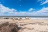 Property view of water with a beach view