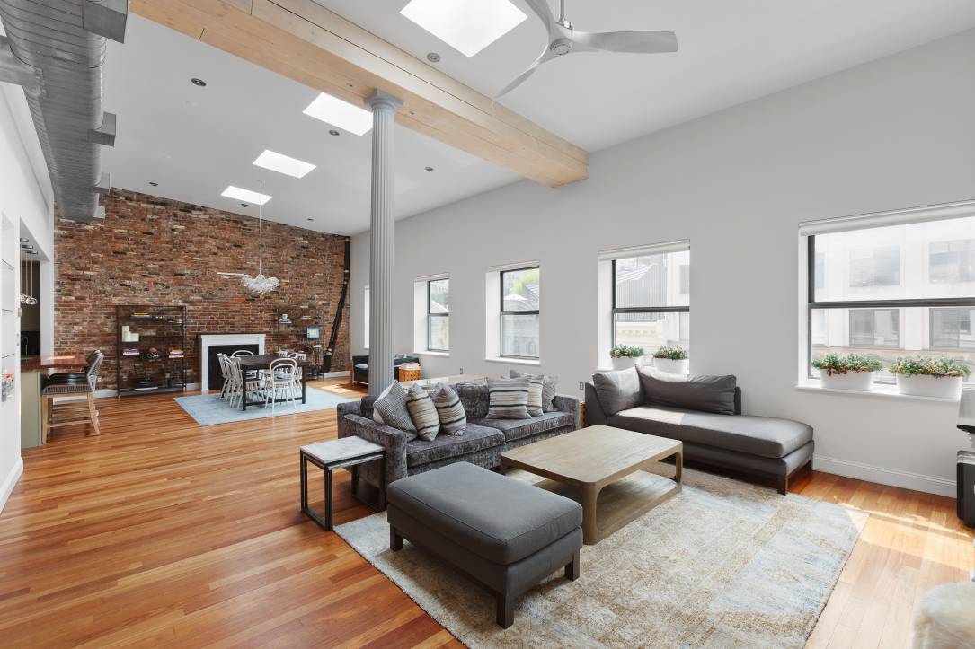 This sprawling TriBeCa loft boasts nearly 2, 300 square feet with four bedrooms and three and a half bathrooms.