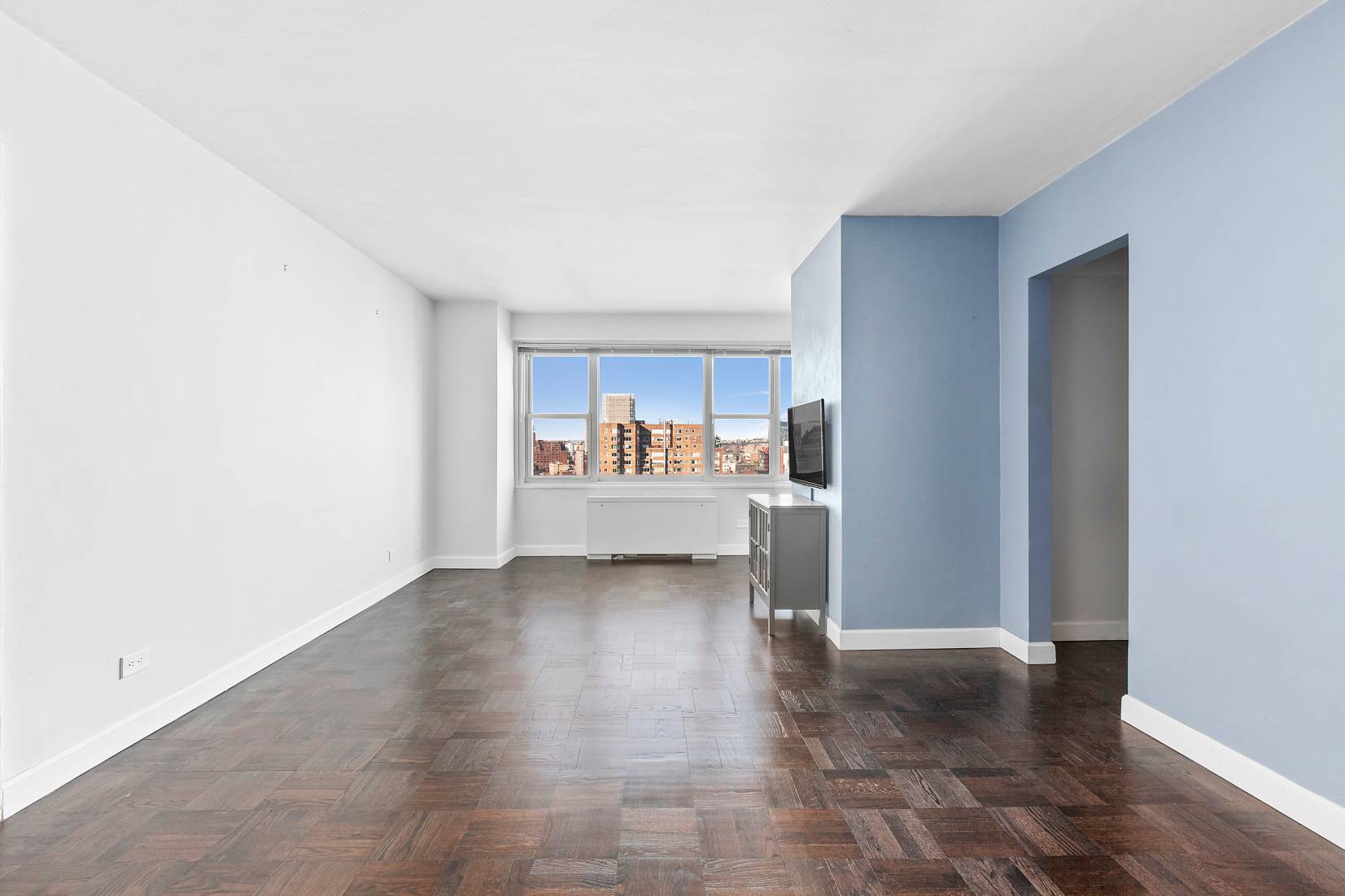 Take in the breathtaking views of this 19th Floor Alcove Studio at the stately John Adams Cooperative.