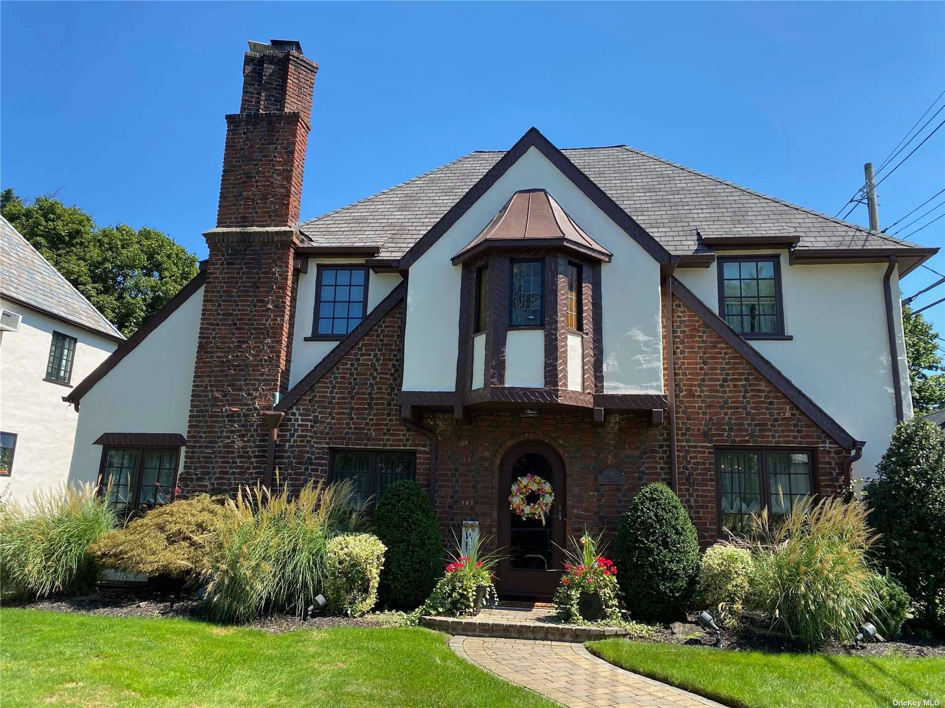 Updated amp ; Spacious this Classic Tudor is ready to move right in !