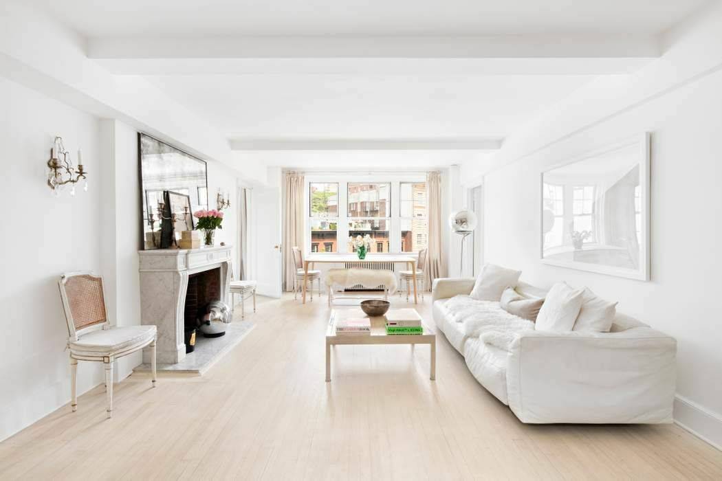 This tastefully renovated 3 bed 3 bath home is ideally perched above Jackson Square Park, affording tree filled views and glorious natural light through its 14 windows.