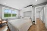 Bedroom featuring dark wood-type flooring and recessed lighting