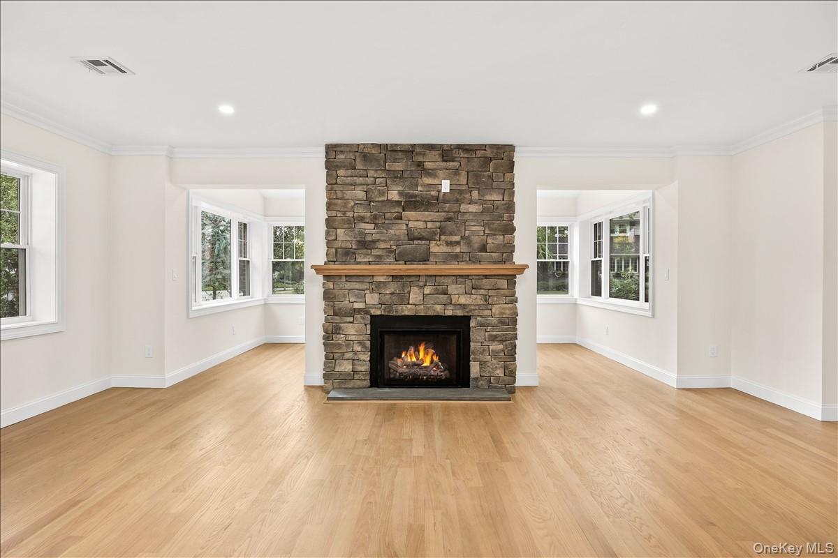 fireplace facing the entry into the sunroom