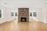 fireplace facing the entry into the sunroom